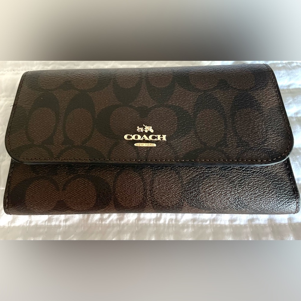Coach wallet, in signature canvas with checkbook.